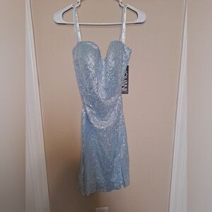 Jovani 07666 Sequin Spaghetti Strap Short Dress Light Blue. Tie up back.